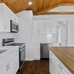 Kitchen remodeling project after with updated cabinets and countertops