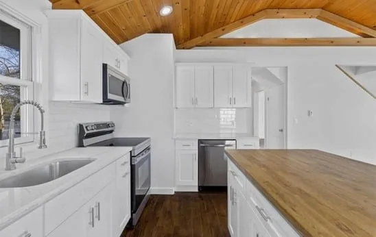 Kitchen remodeling project after with updated cabinets and countertops